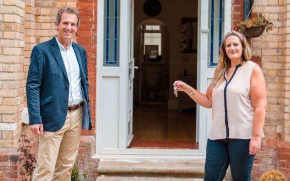 Nick Hole and Vicky James exchange keys