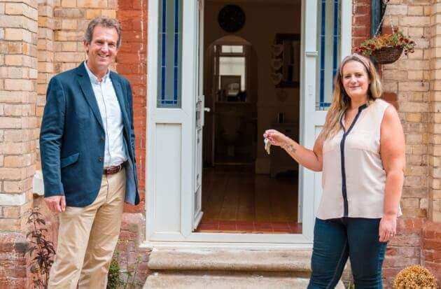 Nick Hole and Vicky James exchange keys