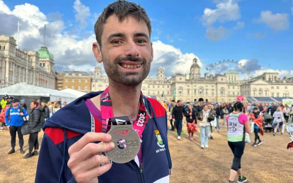 Hugh Allum-Pearce with his London Marathon medal